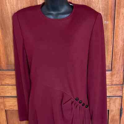 Long sleeve wool jersey dress with asymetrical waist with gathers at hip