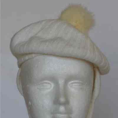 Knitted beret with decorative pompom, ear flaps and chin straps
