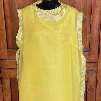 Brocade sleeveless sheath dress and separate chiffon tabard with brocade trim
