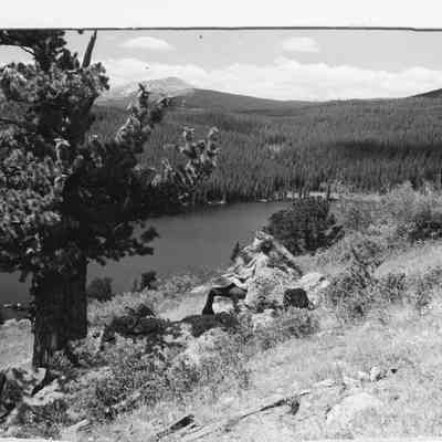 "Jim Peak and Lake, the reason for the picture", shows James Peak, lake, and young woman sitting on a rock, 5"x3.5": Photo 2