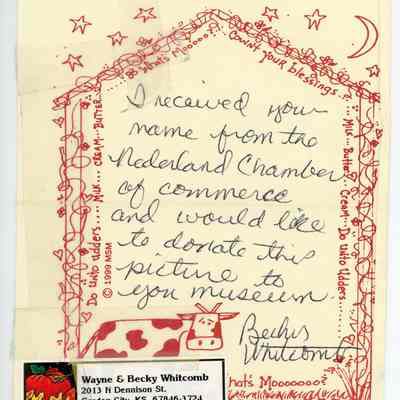 Note that was attached to photo with scotch tape.