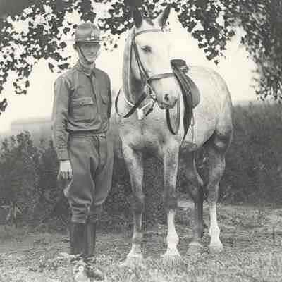 11. Don Kemp in uniform with his horse. Stamped on back: From Sub-Exchange Studio, Ft. Riley, Kansas.: 5"x7" print.