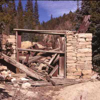 2. Burned-out stamp mill, rock wall, Ward, Colo.: color slide