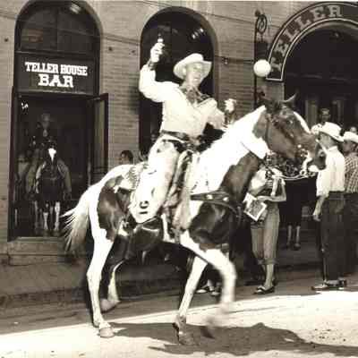 2.: Gray, riding out of Teller House Bar, 1949.