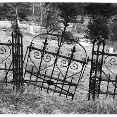 2. Caribou Cemetery gate and fence with several other graves in background.: 8"x10" B&W print