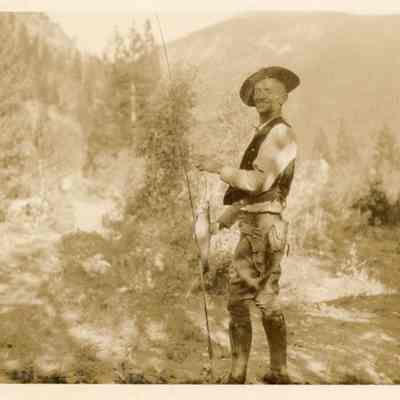 4. Don Kemp fishing - Eldora.: Don Kemp shows off the fish he caught.