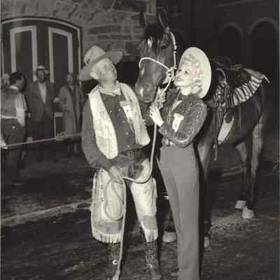 32.: July 14, 1954. Inscribed: Don--(My favorite Roundup Rider) "This is 'Junior"--With wonderful memories of a wonderful day, in Central City- 54. Winnie West. And in different handwriting: I was there too! Brack. Photo by Brachlow (Brack).