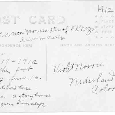 7. Back side of postcard photo 6.