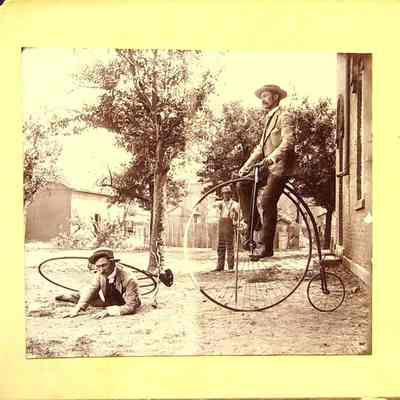 Showing of his riding skills (Right side on Penny-Farthing bicycle)