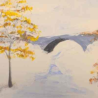 Postcard: Snow covered bridge with fall foliage