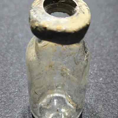 Syringe Bottle: Found in the old OutLot owned by Dr. Baker (beside current Football Stadium).