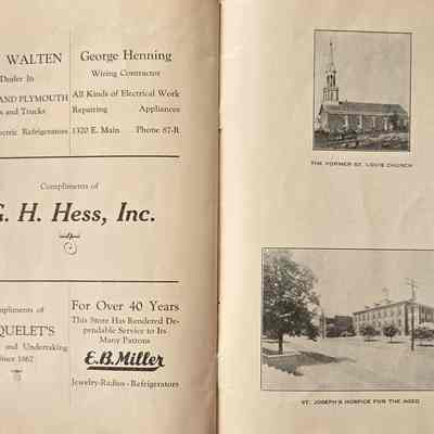Business Advertisements. Picture of former St. Louis Church and St. Joseph's Hospice.