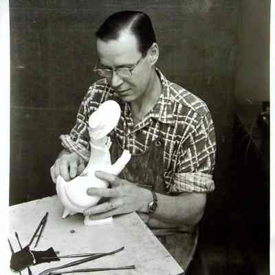 Richard Rogers works on sculpting a goose