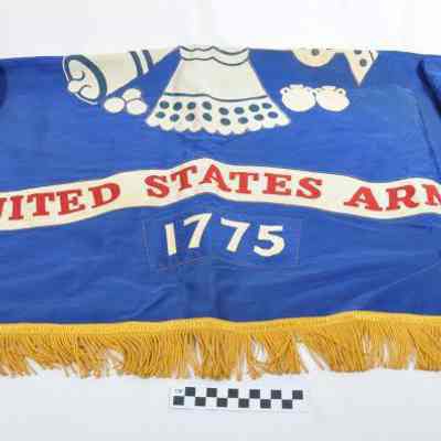 Blue satin flag with gold fringe