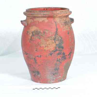 Large two-handled redware jar