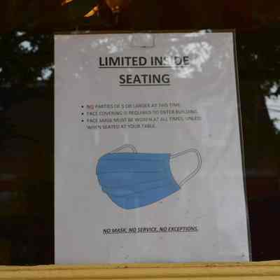 Historic Shepherdstown Museum and Entler Hotel with COVID-19 pandemic signs