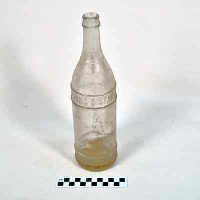 Clear soft drink bottle