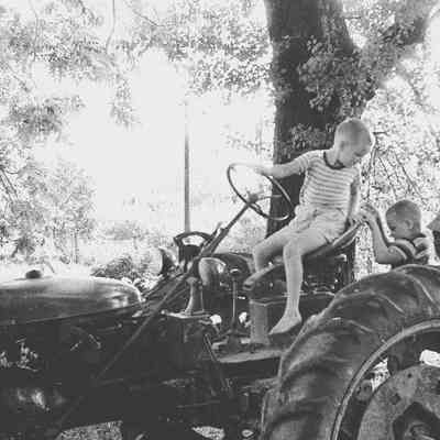 Rob Merchant sitting on tractor at Myers farm