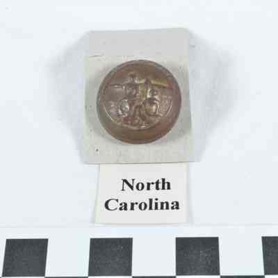 State seal figures Liberty and Plenty with North Carolina