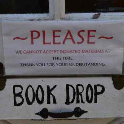 Pandemic sign Shepherdstown Public Library book drop