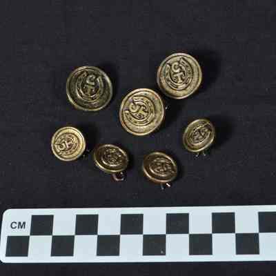 Brass pins with horseshoe and "CT"