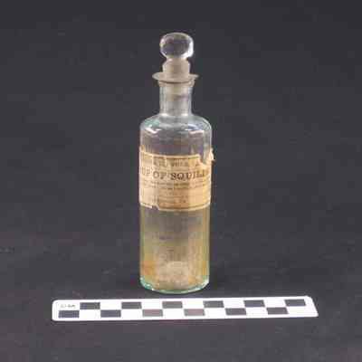 12 sided pharmacy bottle with glass stopper