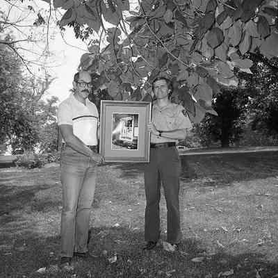 Superintendent Donald W. Campbell receiving photograph: Origformat: Other