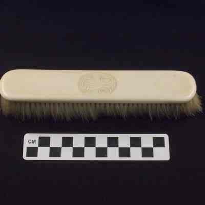 Ivory-backed clothes brush