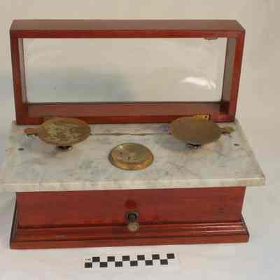 Scales with brass pans, wooden case and marble base