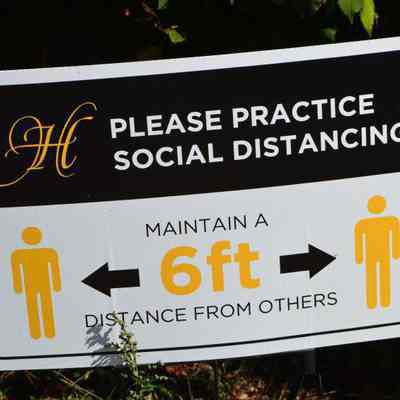 Social-distancing sign, Washington St., Harpers Ferry