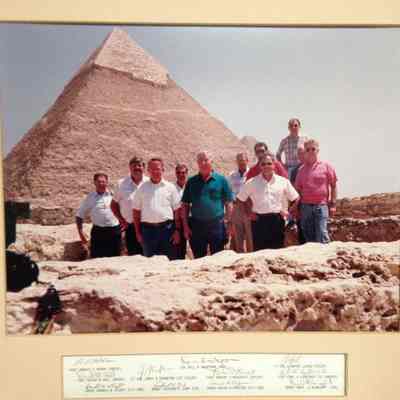 Wayne Lloyd and 10 men in front of a pyramid: Origformat: Other