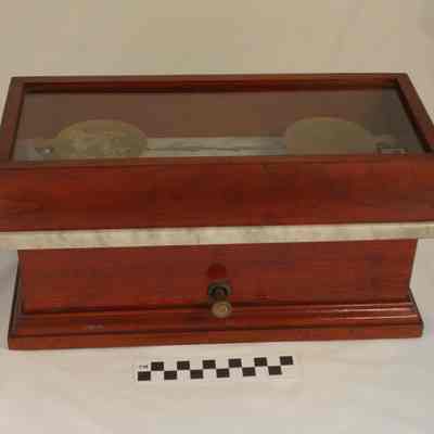 Scales with brass pans, wooden case and marble base