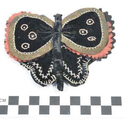 Black velvet butterfly shaped pen wiper