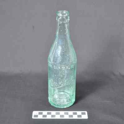 Green glass beverage bottle