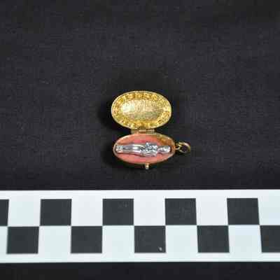 Charm for a bracelet made like a small locket