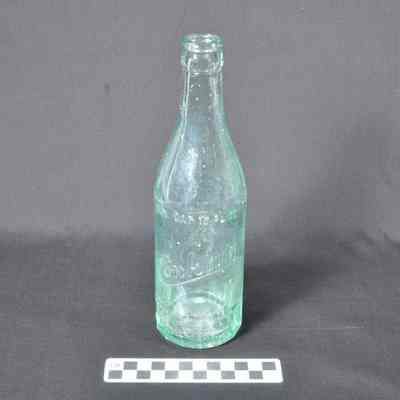 Green glass beverage bottle