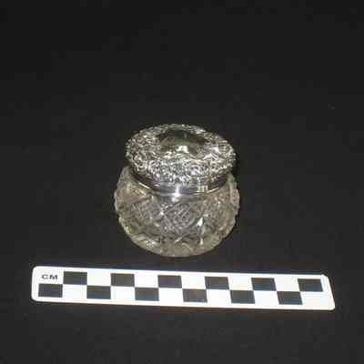 Small cut glass container with silver top monogrammed