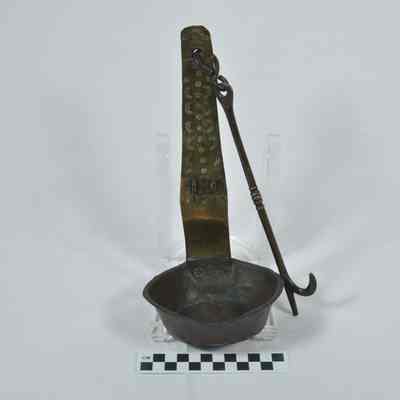 Large brass fat lamp with stamped designs