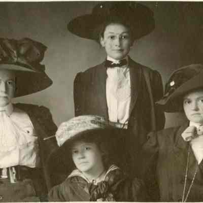 Portrait of four women in hats