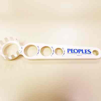 White plastic spaghetti spoon advertising Peoples Bank of Charles Town