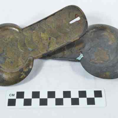 Brass shoulder scales