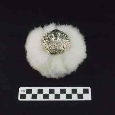 Woman's white powder puff