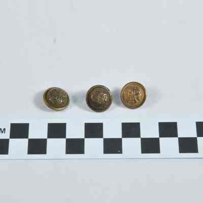 Three brass buttons with the letters "GAR" superimposed