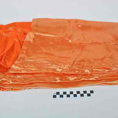 Bright orange satin material