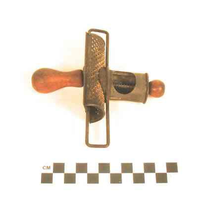 Nutmeg grater, tin and wood