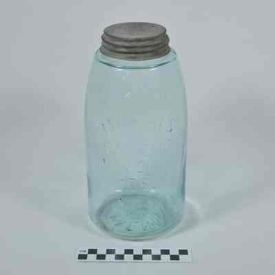 Large, light blue glass jar with lid