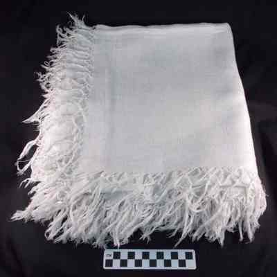 White linen tablecloth with fringe