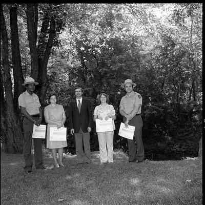 Superintendent Donald W. Campbell presenting awards to park employees: Origformat: Other