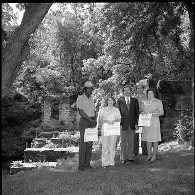 Superintendent Donald W. Campbell presenting awards to park employees: Origformat: Other