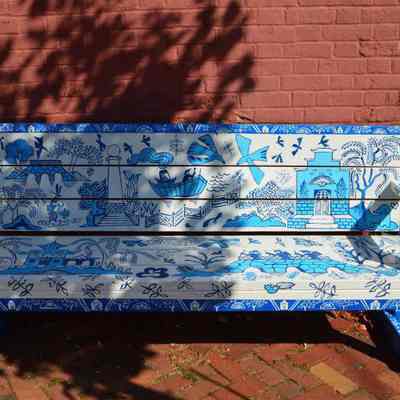 Bench with paintings of buildings and landmarks in Shepherdstown